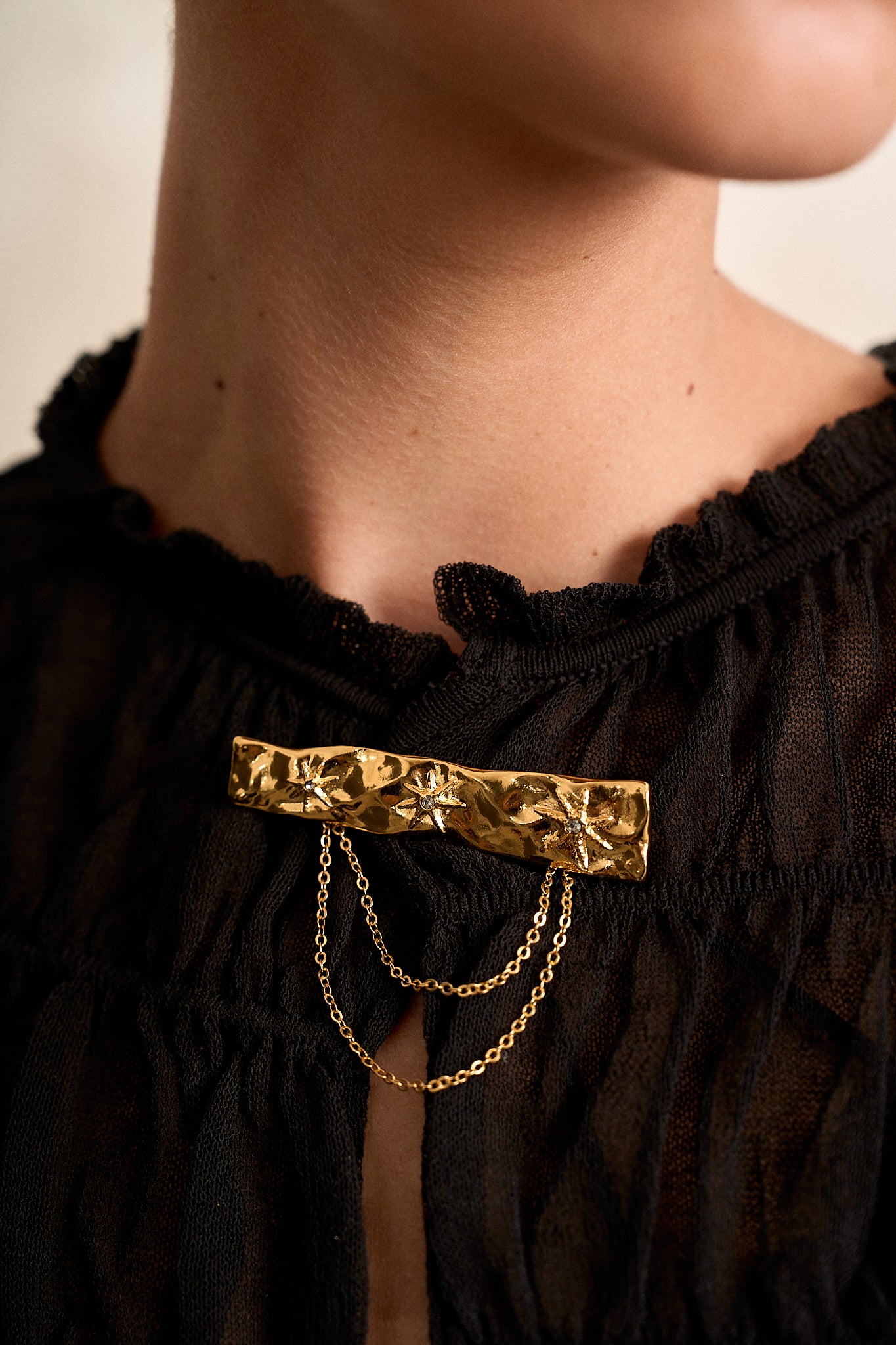 BROCHE TRIADA